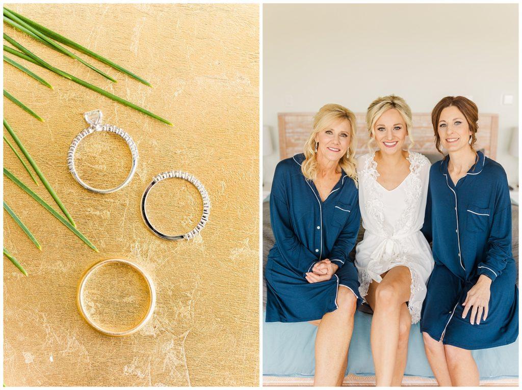Bride and groom kissing surrounded by green and burgundy floral arrangements