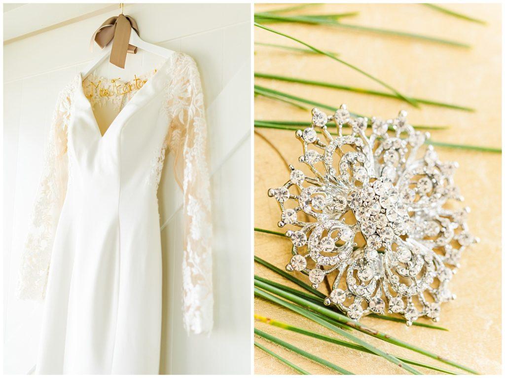 Door decorated with greenery and navy ribbons