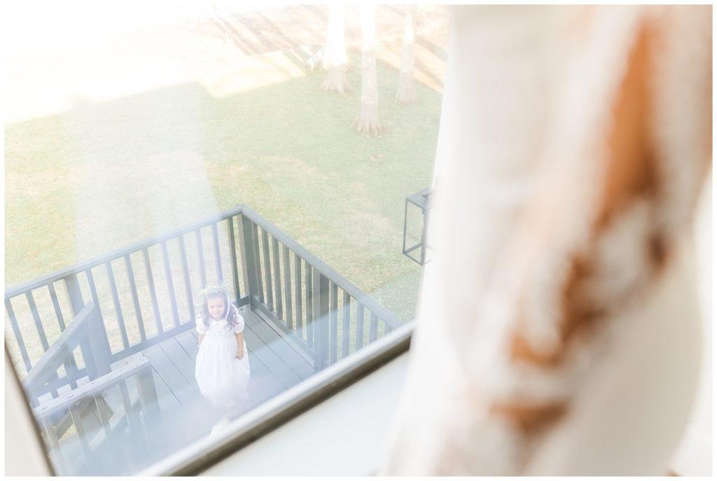 Tall floral arrangement with red and yellow flowers